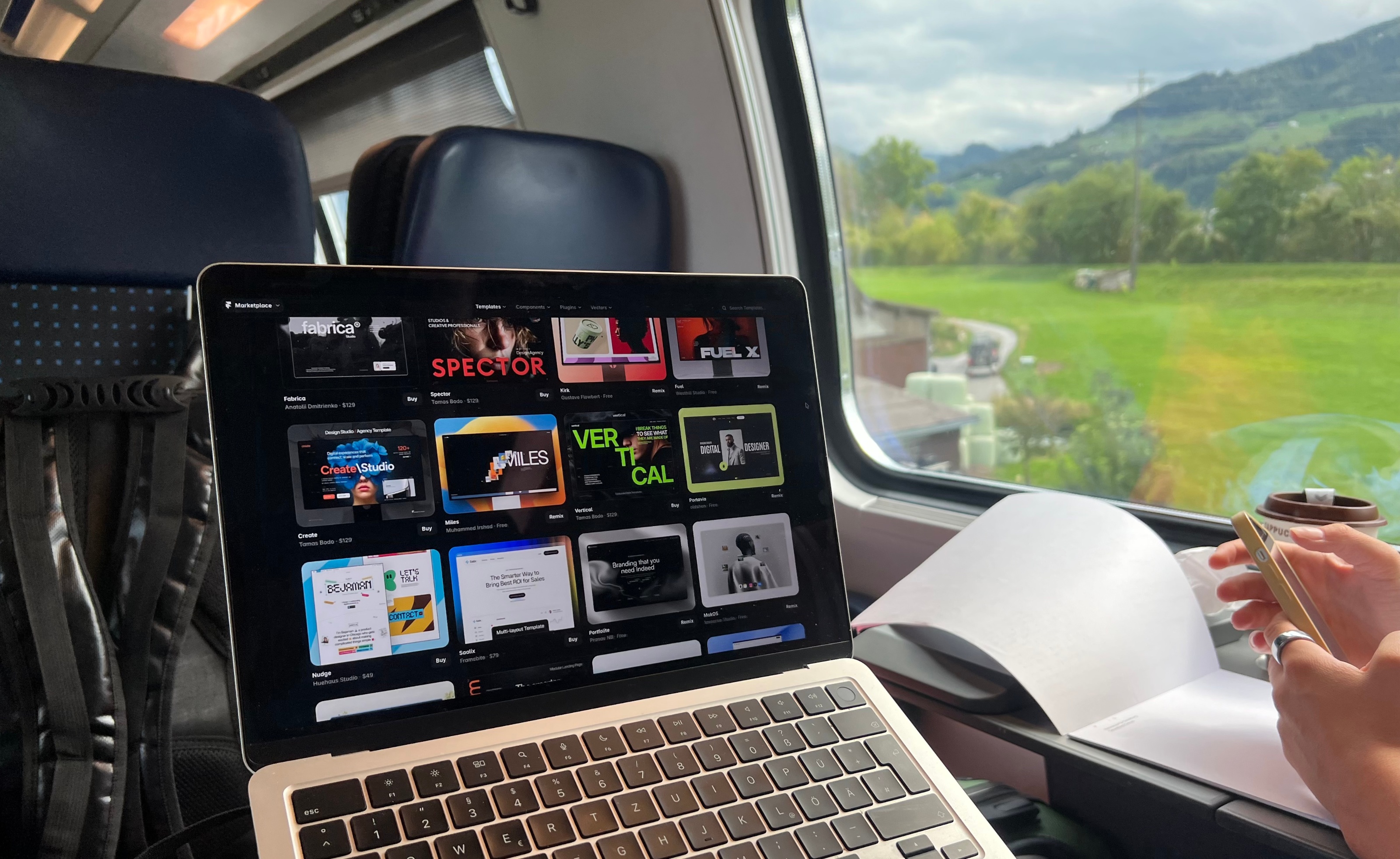 Work setup for today ๐๐๐จ๐ญTravelling through Switzerland by train, laptop open and probably one of the best office views you can get.